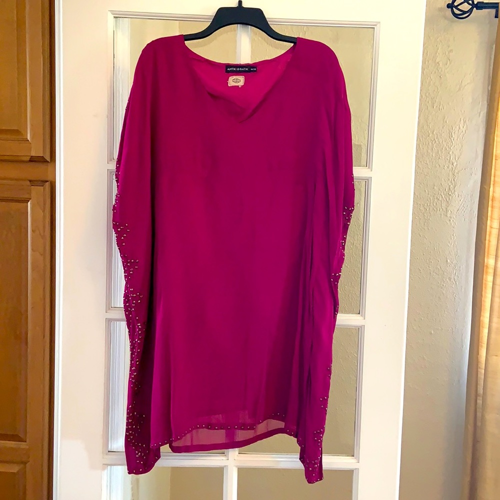 Pink mini dress with gold rivets